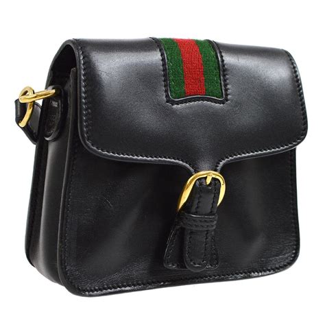 gucci black bag with red and green strap